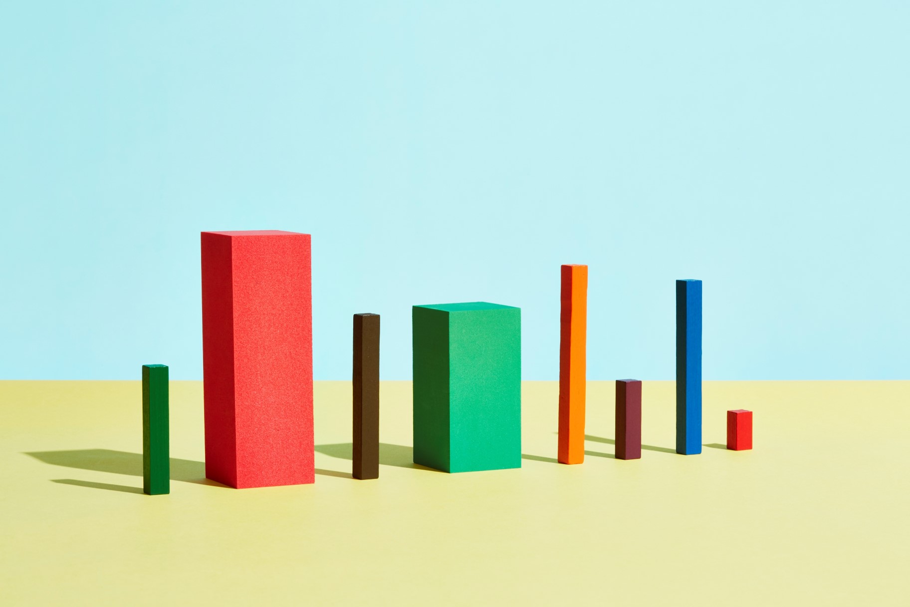 Wooden blocks of varying heights, widths, and colors